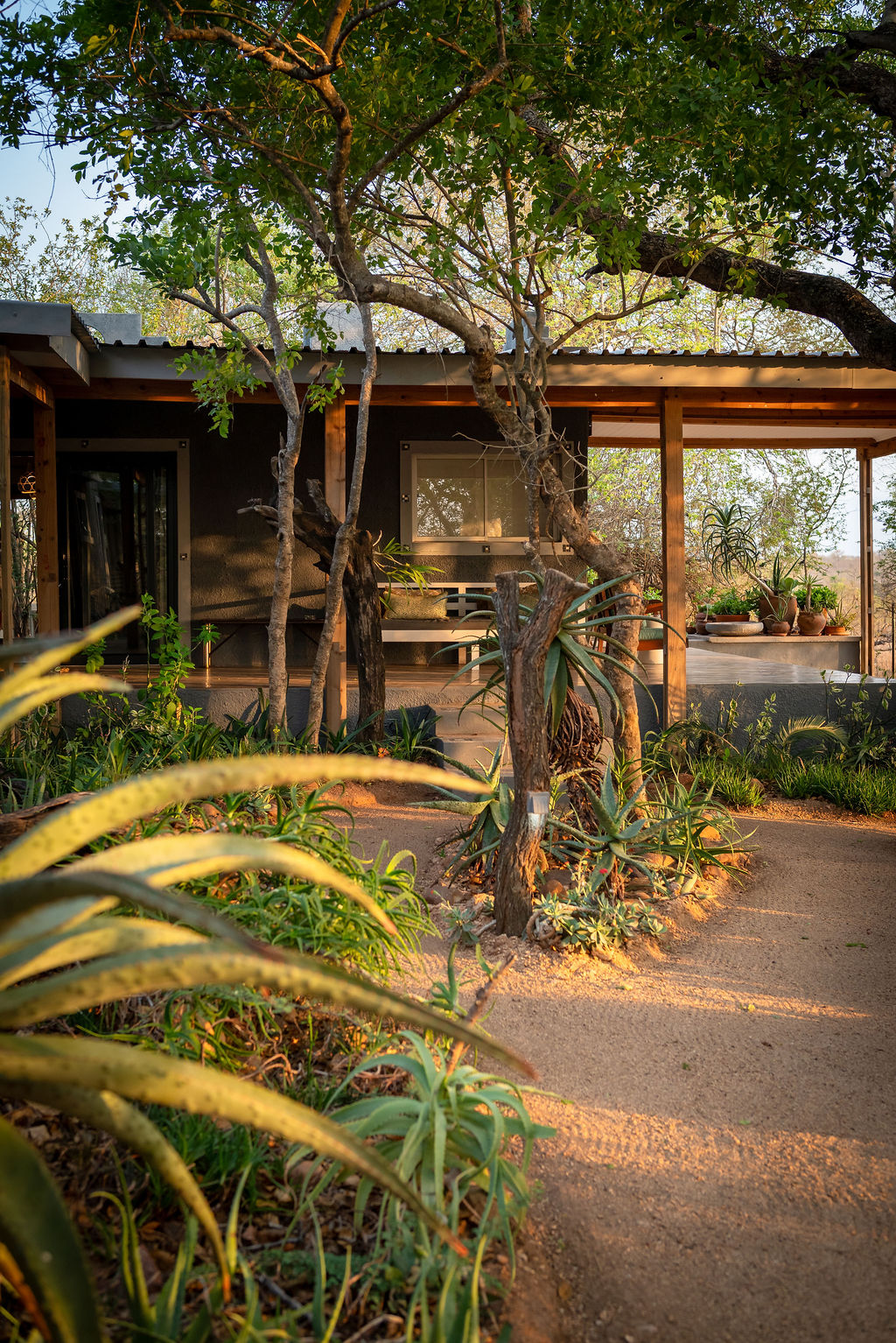 Garden paths and private suites at Tumbeta House